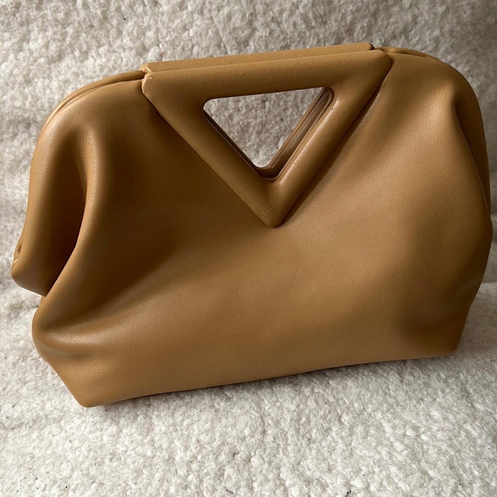 Tan clutch